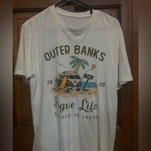 Oversized white “Outerbanks Tee”. No tag or brand, fits as an XL.